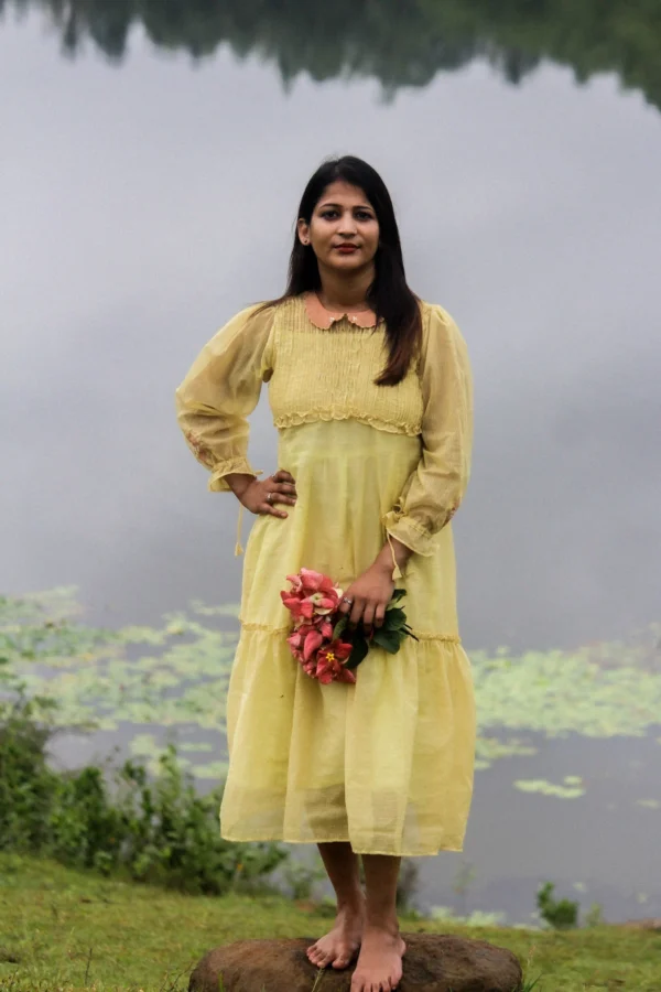 Naturally dyed golden yellow Kota dress with madder peach collar and floral embroidery