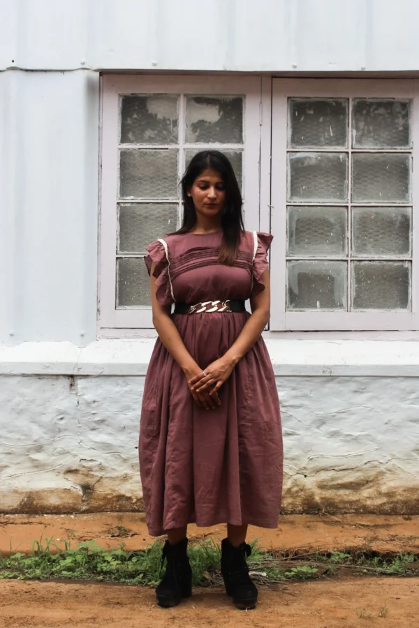 Twilight Berry mul cotton dress with lace-trimmed ruffled sleeves and smocked chest, naturally dyed with sappan wood